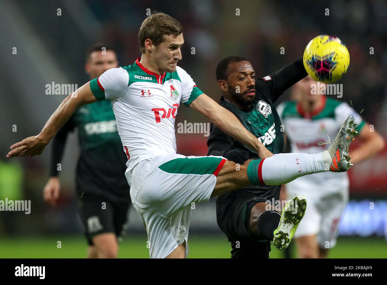 Dmitri Zhivoglyadov (L) of FC Lokomotiv Moscow and Manuel Fernandes of FC Krasnodar vie for the ball during the Russian Football League match between FC Lokomotiv Moscow and FC Krasnodar at RZD Arena on November 10, 2019, in Moscow, Russia. (Photo by Igor Russak/NurPhoto) Stock Photo