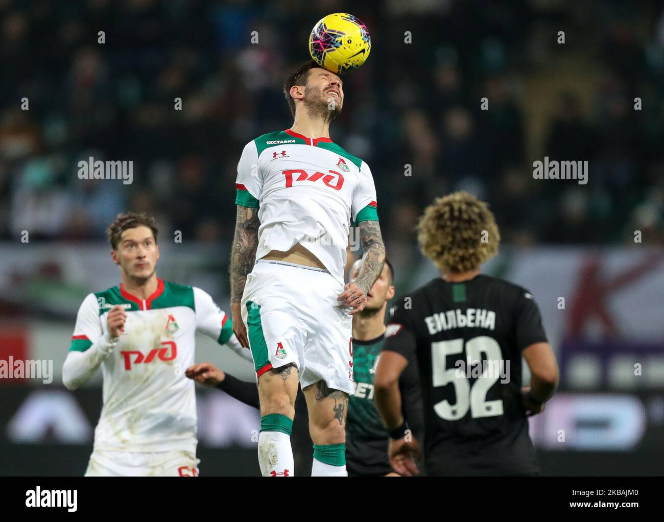 Fedor Smolov (C) of FC Lokomotiv Moscow vie for the ball during the Russian Football League match between FC Lokomotiv Moscow and FC Krasnodar at RZD Arena on November 10, 2019 in Moscow, Russia. (Photo by Igor Russak/NurPhoto) Stock Photo