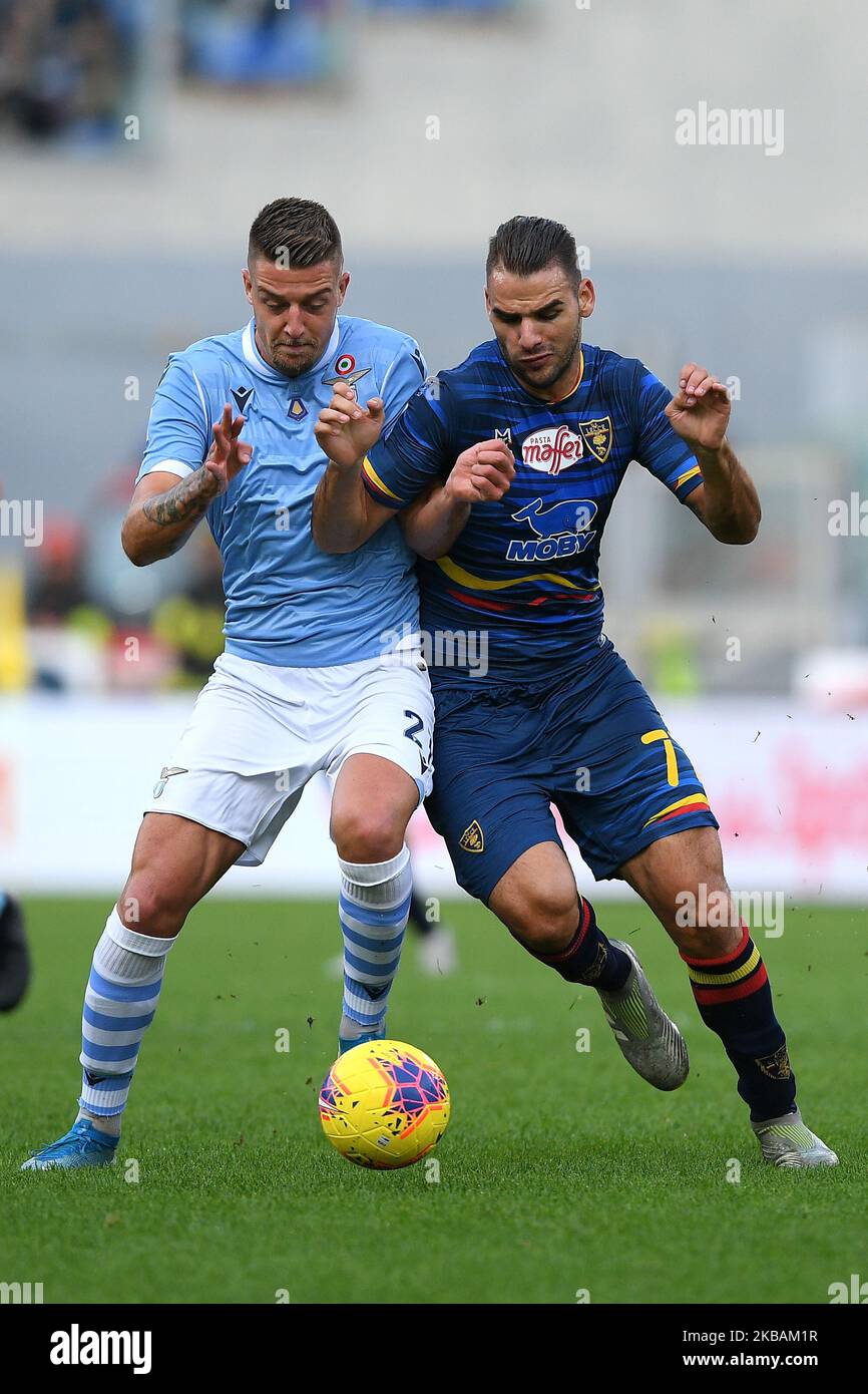 Panagiotis Tachtsidis of US Lecce is challenged by Sergej Milinkovic-Savic of SS Lazio during the Serie A match between SS Lazio and US Lecce at Stadio Olimpico, Rome, Italy on 10 November 2019. (Photo by Giuseppe Maffia/NurPhoto) Stock Photo