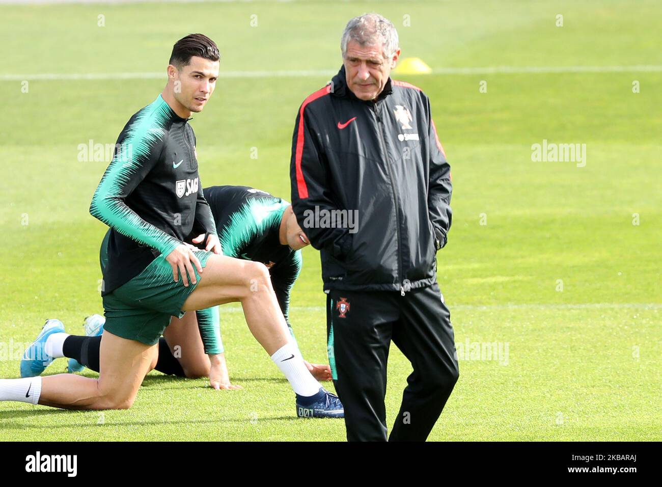 Portugal's forward Cristiano Ronaldo (L ) attends a training session with his teammates at Cidade do Futebol (Football City) training camp in Oeiras, Portugal, on November 12, 2019, ahead of the UEFA EURO 2020 qualifier match against Lithuania. (Photo by Pedro FiÃºza/NurPhoto) Stock Photo
