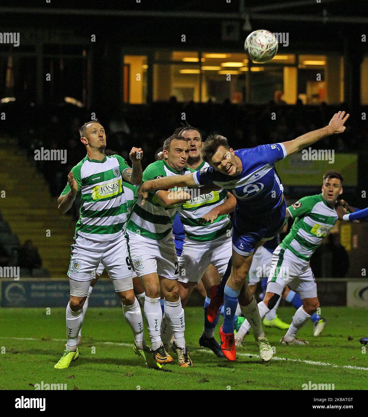 Fraser Kerr beats Charlie Lee to a corner during the FA Cup match 