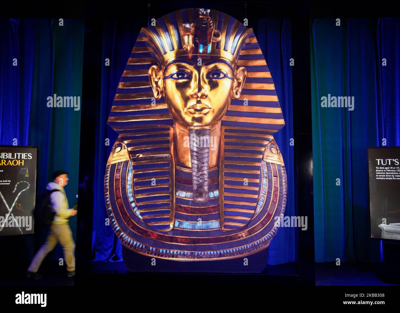 Vancouver, Canada. 3rd Nov, 2022. A visitor walks past a large image of