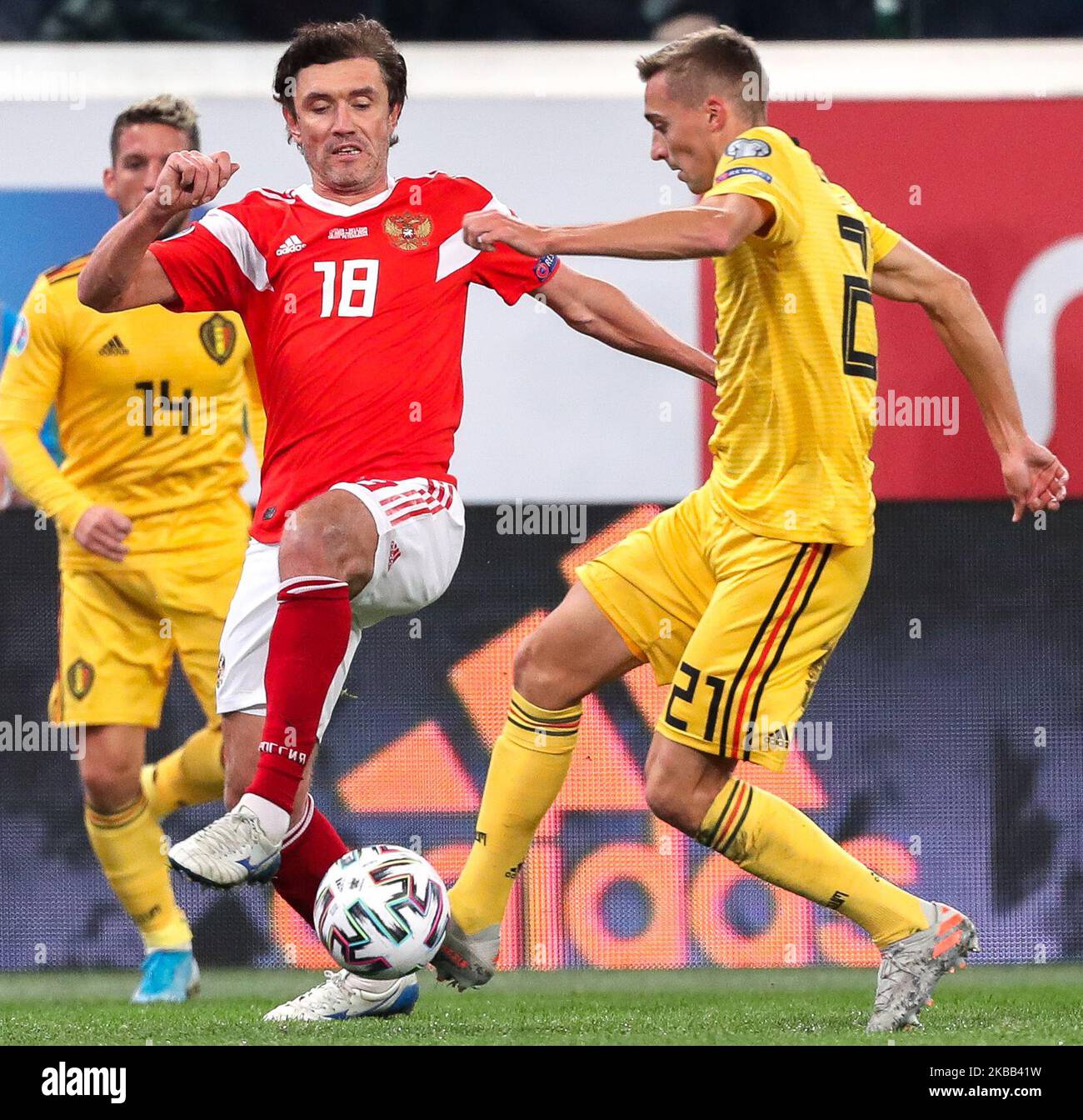 Yuri Zhirkov (C) of Russia and Timothy Castagne (R) of Belgium vie for the ball during the UEFA Euro 2020 Qualifier between Russia and Belgium on November 16, 2019 in Saint Petersburg, Russia. (Photo by Igor Russak/NurPhoto) Stock Photo