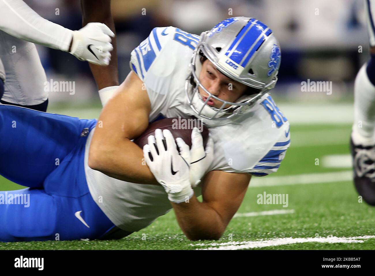 Detroit Lions tight end T.J. Hockenson (88) is taken down by Dallas Cowboys free safety Xavier Woods (25) during the first half of an NFL football game against the Dallas Cowboys in Detroit, Michigan USA, on Sunday, November 17, 2019. (Photo by Amy Lemus/NurPhoto) Stock Photo