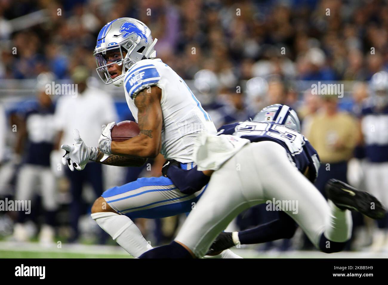 Detroit Lions wide receiver Marvin Jones (11) runs the ball under the pressure of Dallas Cowboys defensive back Darian Thompson (23) into the endzone for a touchdown during the second half of an NFL football game against the Dallas Cowboys in Detroit, Michigan USA, on Sunday, November 17, 2019. (Photo by Amy Lemus/NurPhoto) Stock Photo