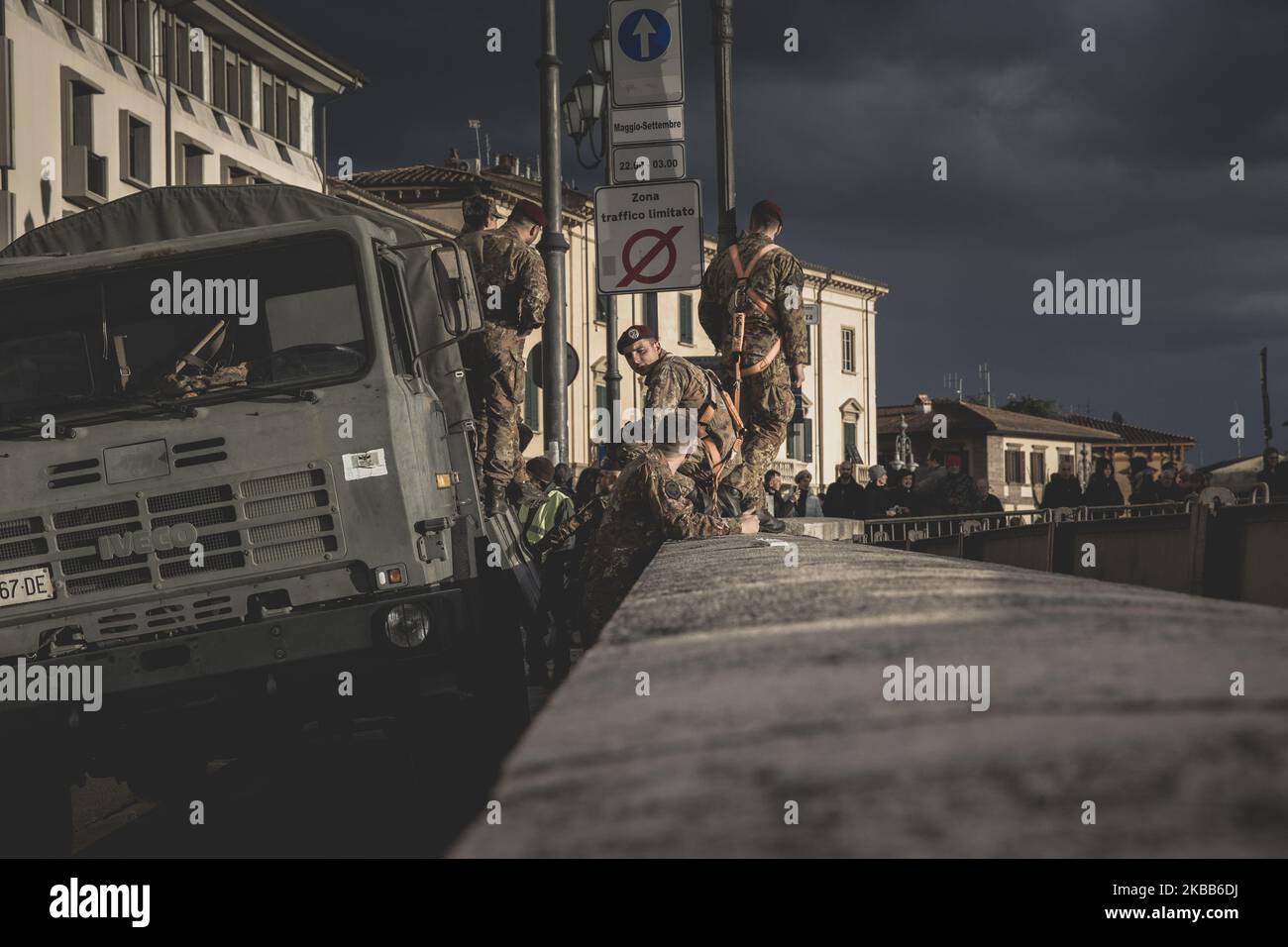 Italian soldiers fill sandbags in preparation for increased flooding of the Arno River in Pisa, Italy on 17 November 2019. There is a risk of flood and Italian army set several barriers along the river to prevent the flood. (Photo by Enrico Mattia Del Punta/NurPhoto) Stock Photo