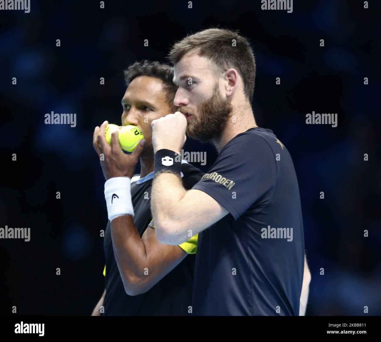 L-R Raven Klaasen (RSA) and Michael Venus (NZL) during Doubles Championship Semi-Final match Raven Klaasen (RSA) and Michael Venus (NZL) against Juan Sebastian Cabal and Robert Farah (COL) International Tennis - Nitto ATP World Tour Finals Day 7 - Tuesday 16th November 2019 - O2 Arena - London (Photo by Action Foto Sport/NurPhoto) Stock Photo