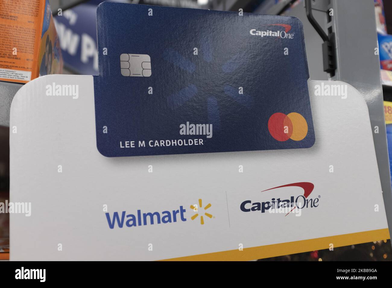 A Capital One Walmart credit card sign is seen at a store in