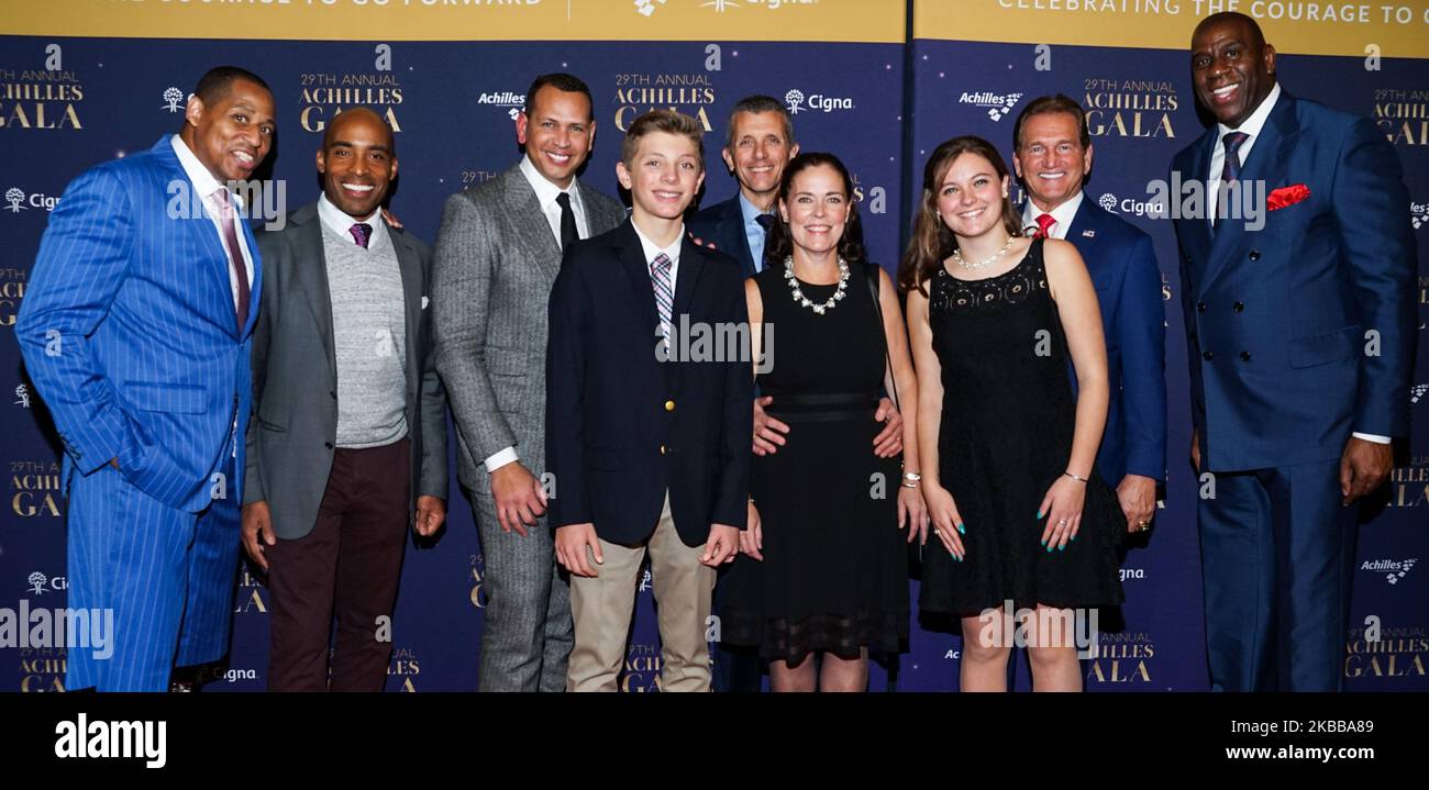 MANHATTAN, NEW YORK CITY, NEW YORK, USA - NOVEMBER 20: Cedric King, Tiki Barber, Alex Rodriguez, David Cordani, Joe Theismann and Magic Johnson arrive at the 29th Annual Achilles Gala held at Cipriani South Street on November 20, 2019 in Manhattan, New York City, New York, United States. (Photo by William Perez/Image Press Agency/NurPhoto) Stock Photo