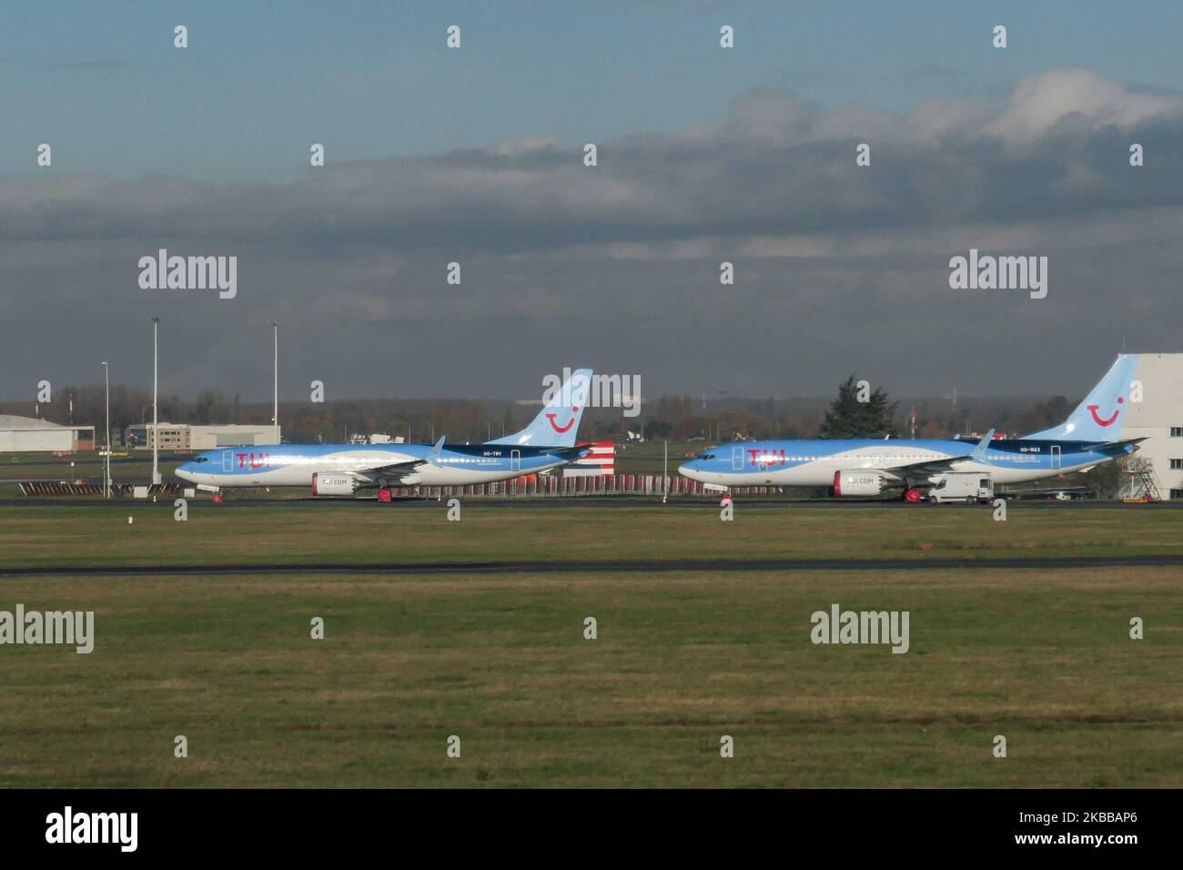 Batch of TUI fly Belgium or TUI Airways Boeing 737 MAX 8 airplanes grounded at Brussels National Airport Zaventem BRU EBBR in Belgium. The planes are parked with wheels and engines covered since March 12, 2019 as the EASA - European Union Aviation Safety Agency suspended all flight operations and FAA of the 737 MAX 8 and 737 MAX 9 with a safety directive because of the MCAS system failure resulting two accidents of the same new aircraft type. TUI fly Belgium is a subsidiary airline of the TUI Group and part of the TUI Airlines. TUI Airways, formerly Thomson Airways BY TOM TOMJET is the largest Stock Photo