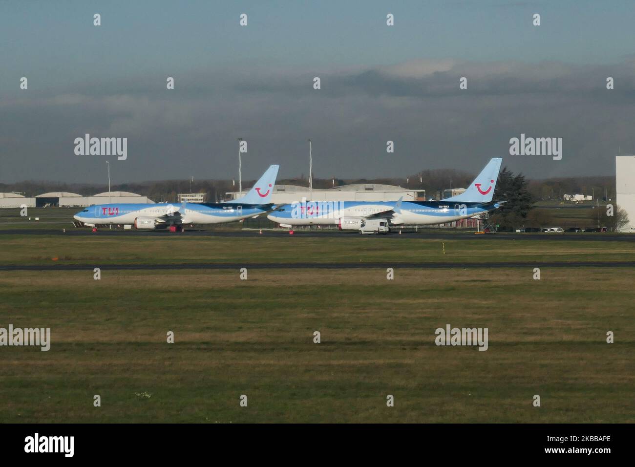 Batch of TUI fly Belgium or TUI Airways Boeing 737 MAX 8 airplanes grounded at Brussels National Airport Zaventem BRU EBBR in Belgium. The planes are parked with wheels and engines covered since March 12, 2019 as the EASA - European Union Aviation Safety Agency suspended all flight operations and FAA of the 737 MAX 8 and 737 MAX 9 with a safety directive because of the MCAS system failure resulting two accidents of the same new aircraft type. TUI fly Belgium is a subsidiary airline of the TUI Group and part of the TUI Airlines. TUI Airways, formerly Thomson Airways BY TOM TOMJET is the largest Stock Photo