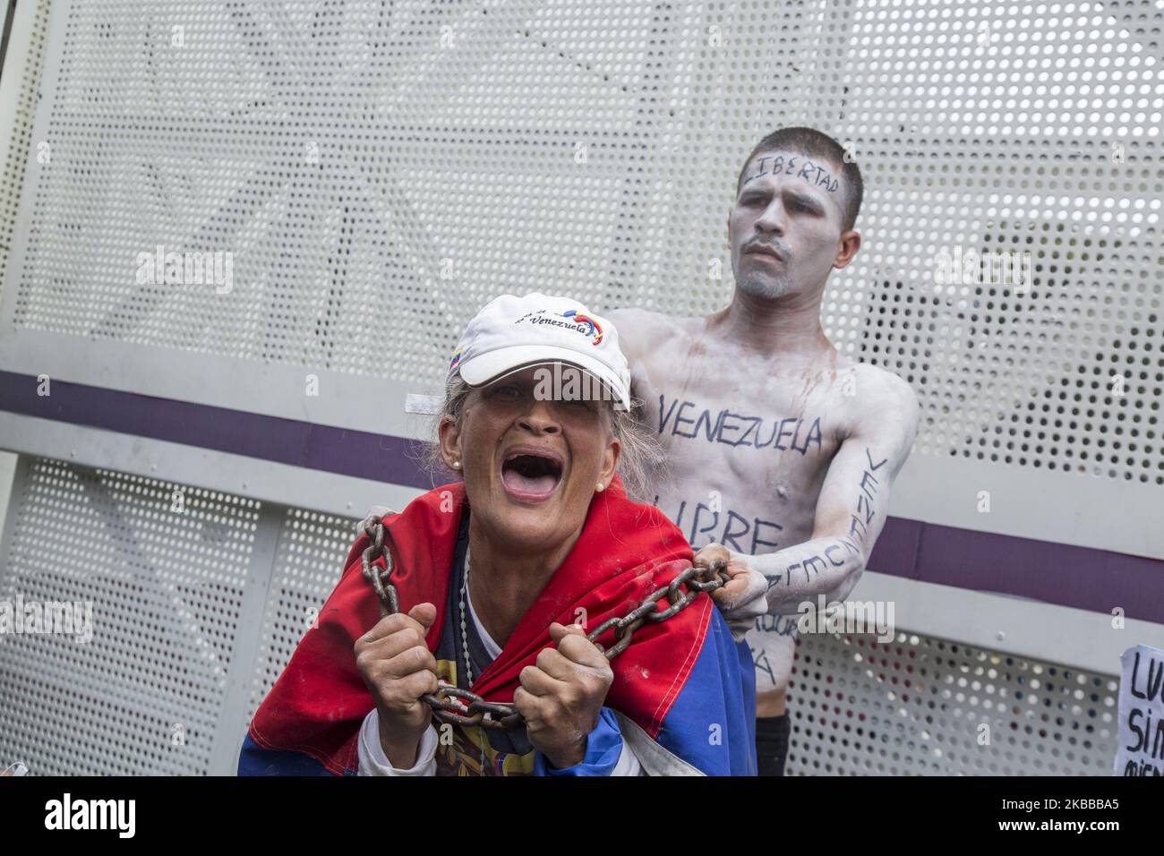A university student demonstrates with his body painted during a protest against Venezuela's President Nicolas Maduro in Caracas on November 21, 2019. (Photo by Rafael Briceno Sierralta/NurPhoto) Stock Photo