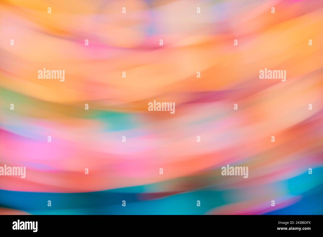 Abstract delicate background in soft pastel colors, fluid dynamic design with colourful lights in spin motion. Stock Photo