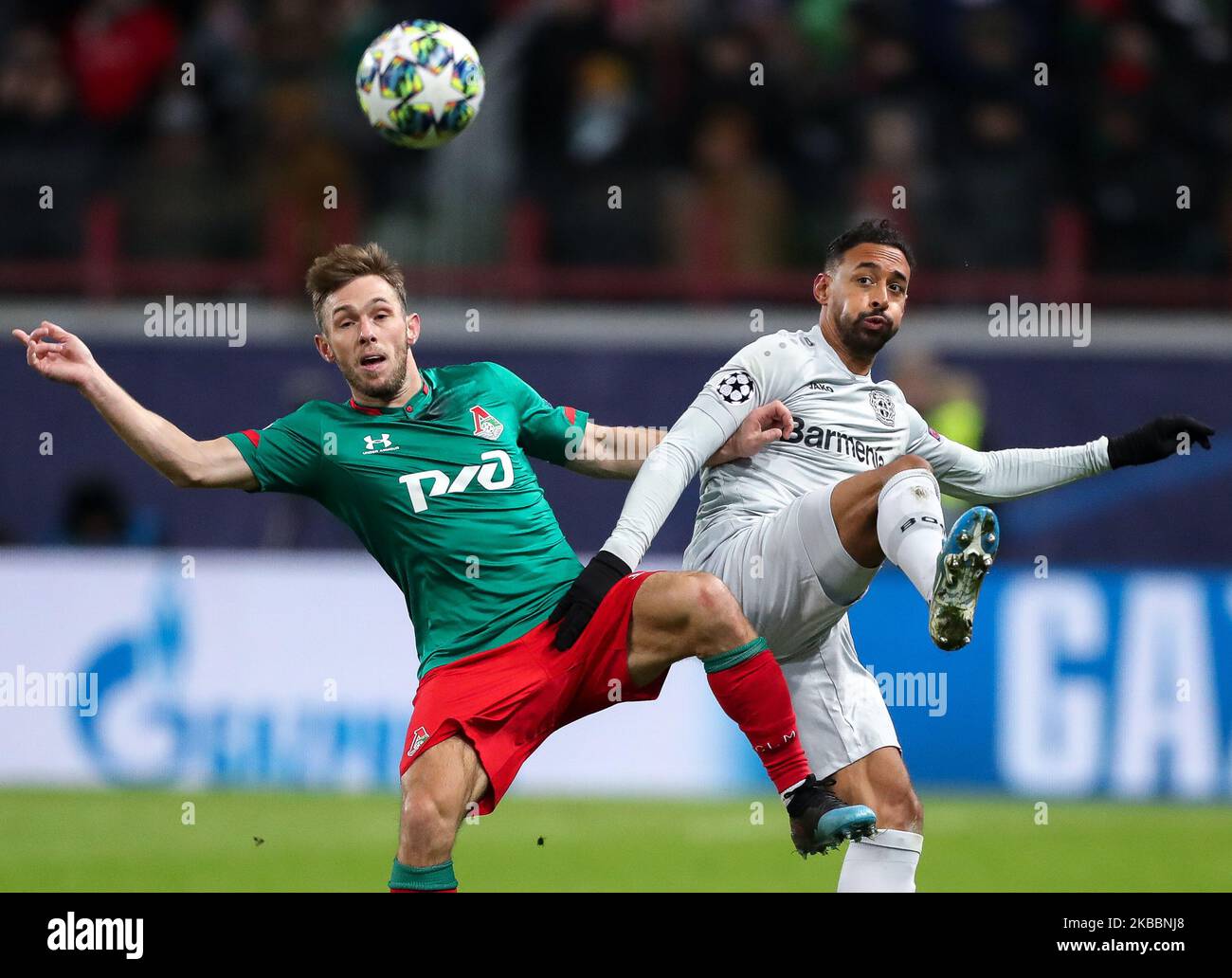 Maciej Rybus of FC Lokomotiv Moskva (L) and Karim Bellarabi of Bayer Leverkusen vie for the ball during the UEFA Champions League group D match between FC Lokomotiv Moskva and Bayer Leverkusen at RZD Arena on November 26, 2019 in Moscow, Russia. (Photo by Igor Russak/NurPhoto) Stock Photo
