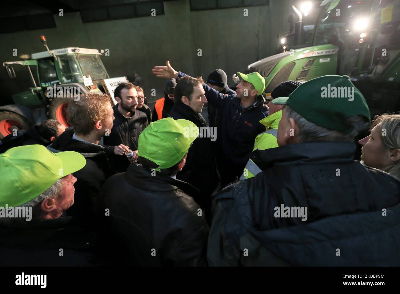 French farmers steer their tractors on The Parisian ring road (Peripherique) at Porte Dauphine in Paris on November 27, 2019, during a protest against government policies. Hundreds of French farmers descended on Paris by tractor to protest the struggles of the farming community and put pressure on supermarket chains to pay them more for their produce. Some 340 kilometres (210 miles) of tailbacks were reported during rush hour in Paris as convoys of tractors snarled traffic along the main roads into the capital. (Photo by Michel Stoupak/NurPhoto) Stock Photo