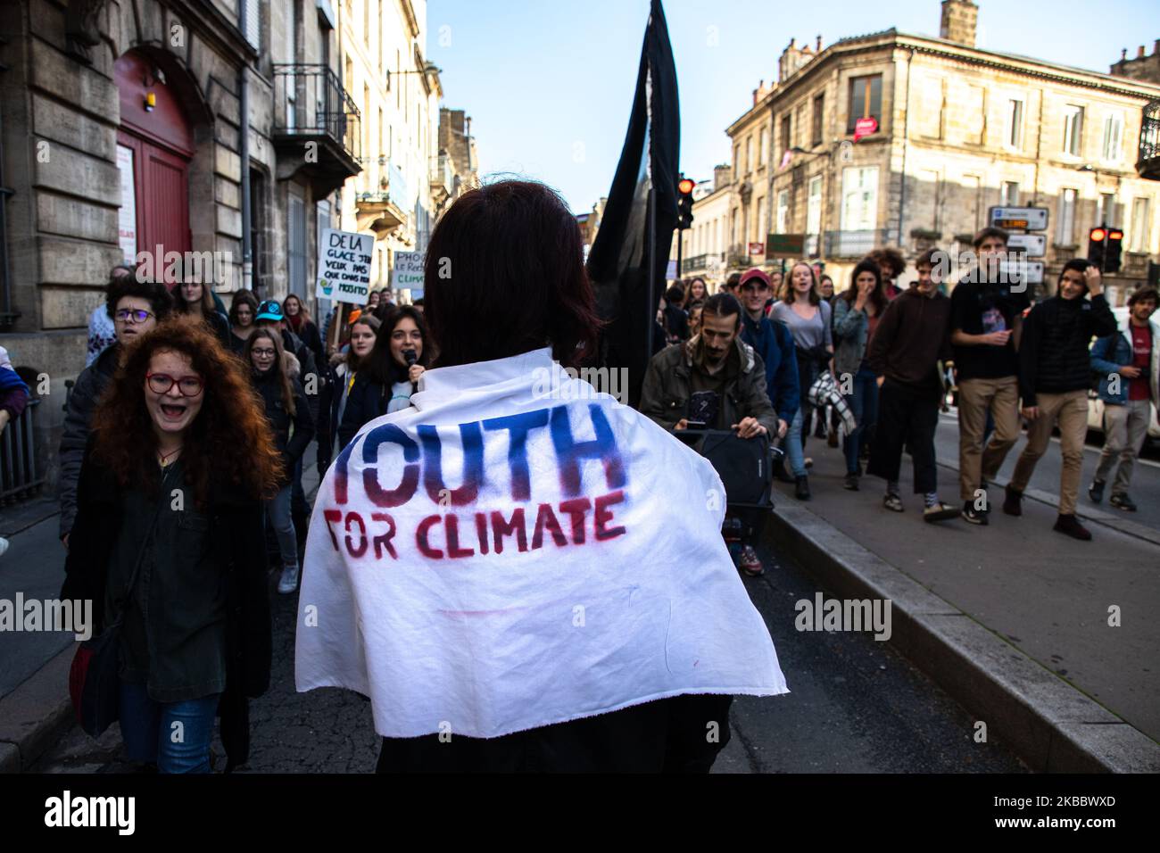 March against the black friday and for the climate in Bordeaux, France, on 29 November 2019. Block friday against black friday makes actions in Bordeaux in France, starting by a march with the march for the climate, some activist sit and block the stores galeries lafayette and the apple store tin the center of Bordeaux, by the associations of youth for the climate, extinction rebellion, and AnvCop21, some activist sit in the apple store before the police get them out. (Photo by Jerome Gilles/NurPhoto) Stock Photo