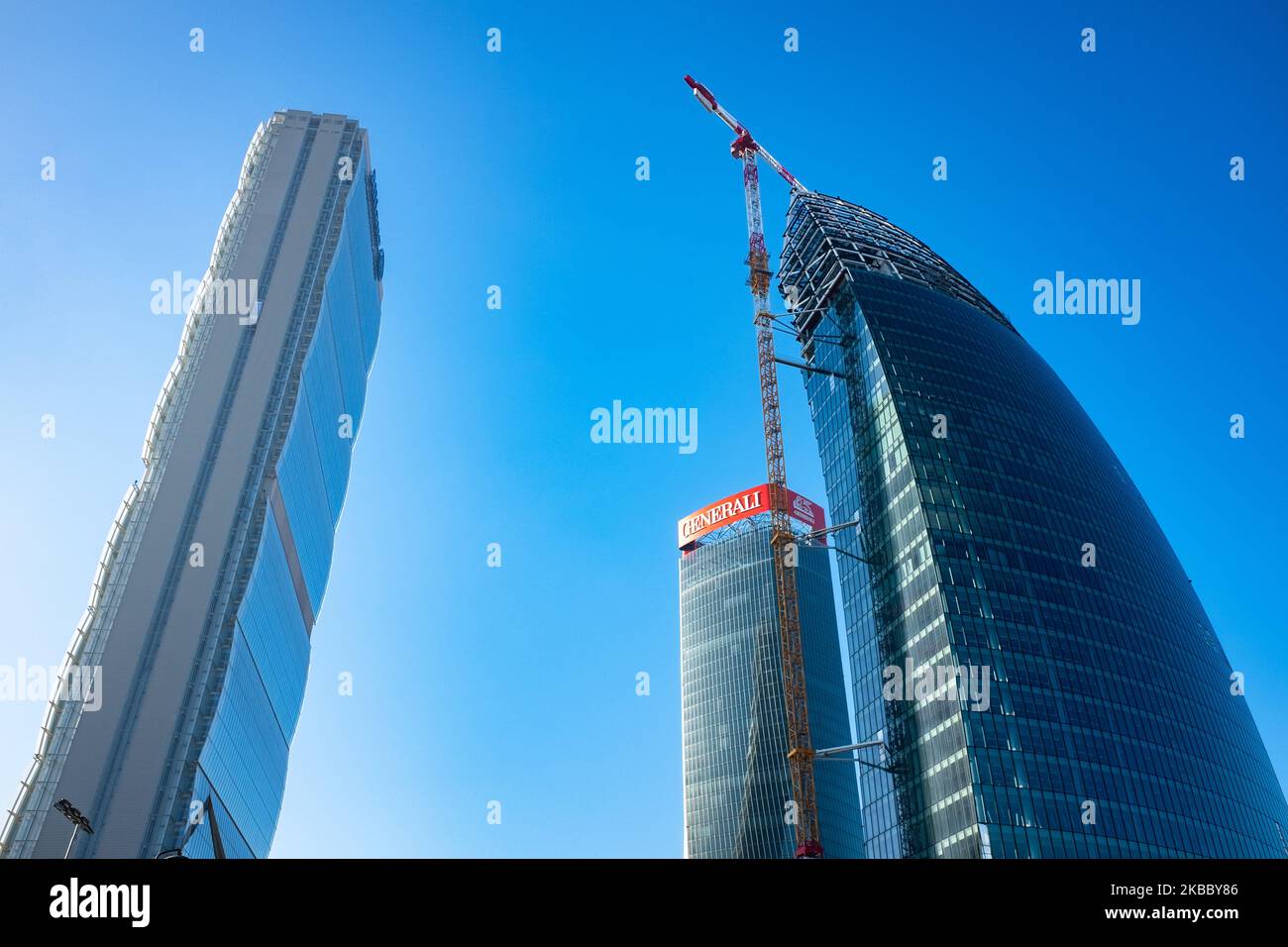 View of the three CityLife skyscrapers, Allianz Tower (L), Generali Tower (C) and Libeskind Tower (R), Italy, November 30 2019. CityLife is a residential, commercial and business district under construction situated a short distance from the old city centre of Milan, Italy; it has an area of 36.6 hectares (90 acres). The development is being carried out by a company controlled by Generali Group, that won the international tender for the redevelopment of the historic neighborhood of Fiera Milano with an offer of 523 million. The project is designed by famous architects Zaha Hadid, Arata Isozaki Stock Photo