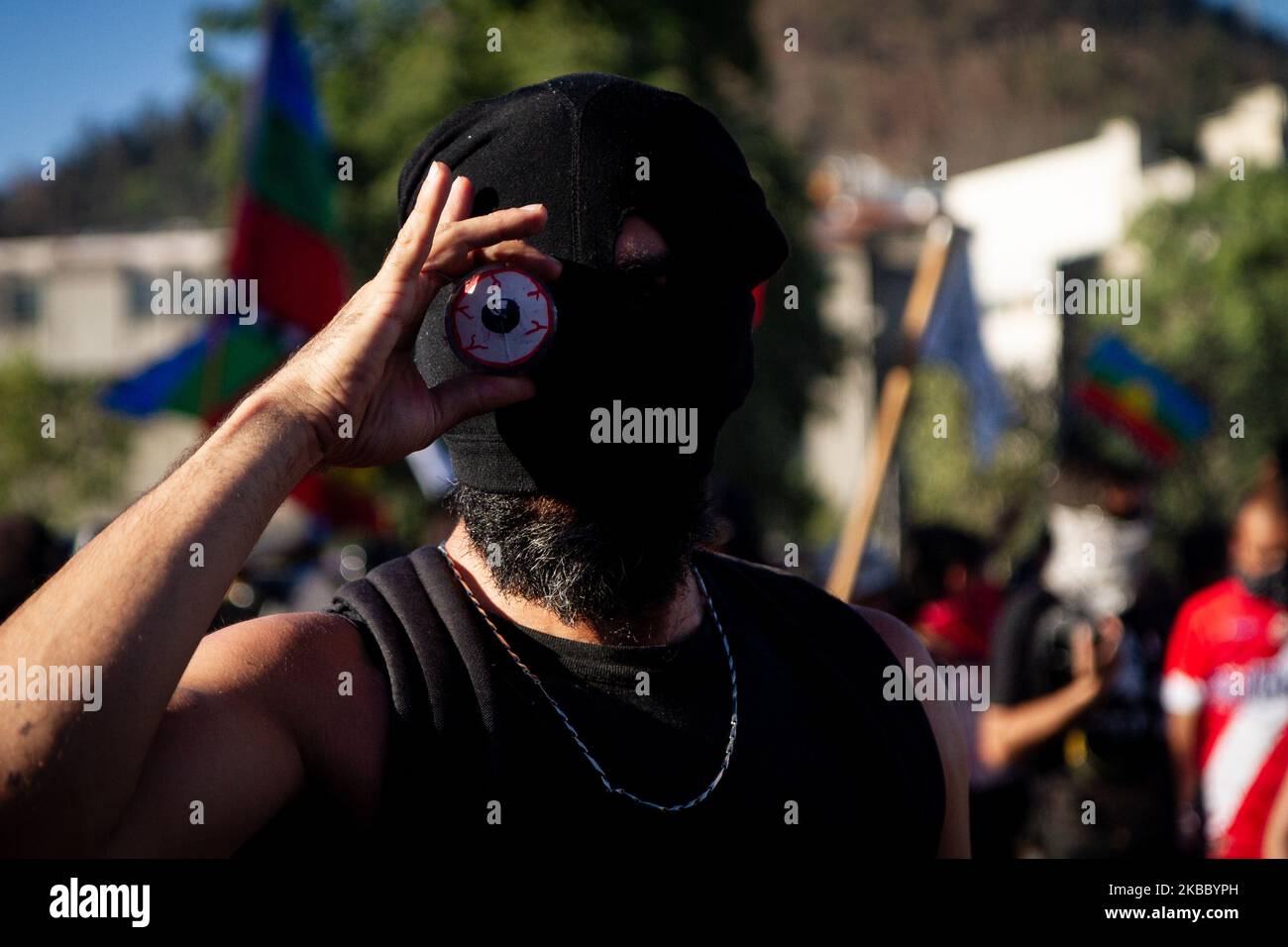 Demonstrators concentrated on 29 November 2019 in the center of the Santiago de Chile, Chile quarreling performant differences against the abuses of the security forces, and the mutilated eyes by the police forces in the protests against the government of Sebatian Pinera (Photo by Federico Rotter/NurPhoto) Stock Photo