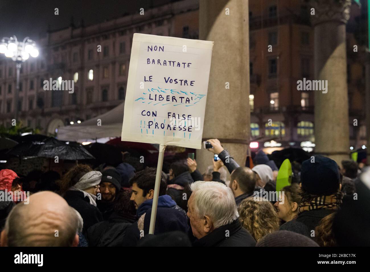 Milan, Italy, Sunday, December 01, 2019. Thousands of people gathered in Piazza Duomo in Milan for the ‘Sardine’ movement, to demonstrate against Salvini the leader of the 'Lega nord' to reassert values of tolerance and moderation. The people create a collective singsong, involving the old Resistance favourite, Bella Ciao. (Photo by Mauro Ujetto/NurPhoto) Stock Photo