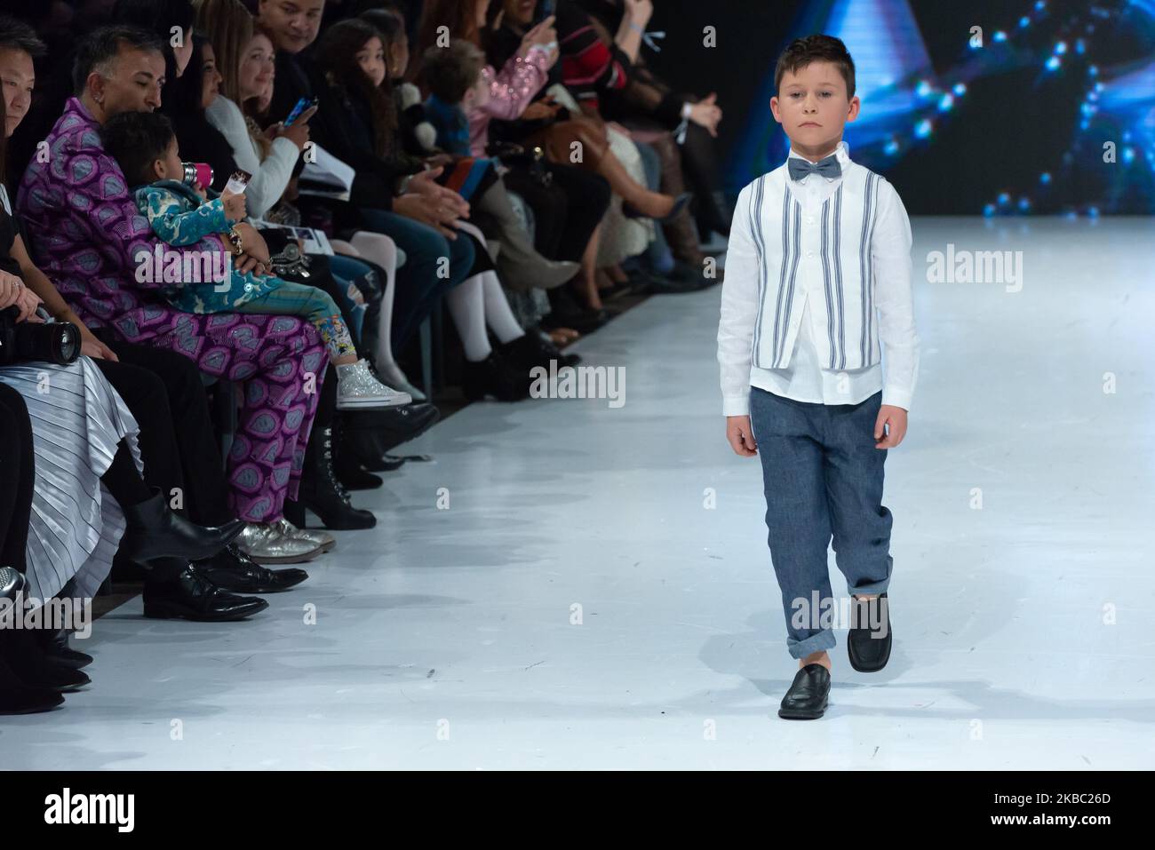 A model walks the runway at the Moka collection for Spring and Summer 2020 during the third annual Toronto Kids Fashion Week fashion show on November 30, 2019 in Toronto, Canada (Photo by Anatoliy Cherkasov/NurPhoto) Stock Photo
