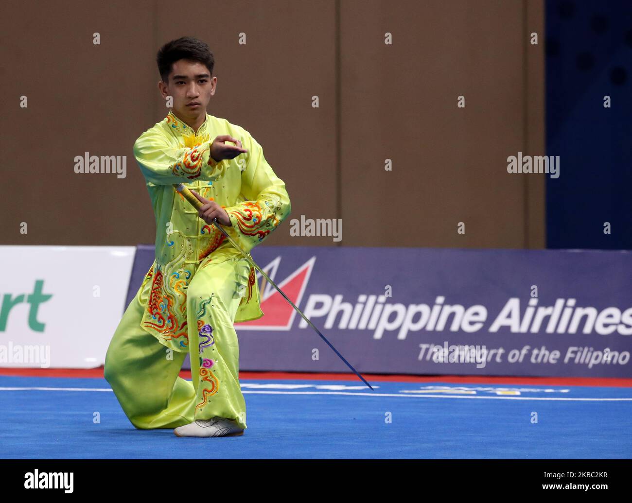 Jones Llabres Inso of the Philippines performs his routine for the ...