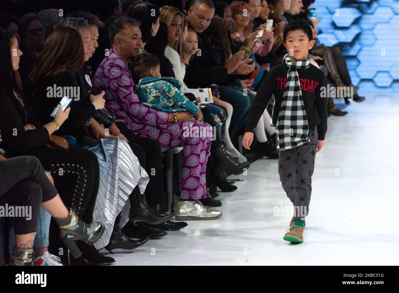 A model walks the runway at the Coyote Pretty collection for Spring and Summer 2020 during the third annual Toronto Kids Fashion Week fashion show on November 30, 2019 in Toronto, Canada (Photo by Anatoliy Cherkasov/NurPhoto) Stock Photo