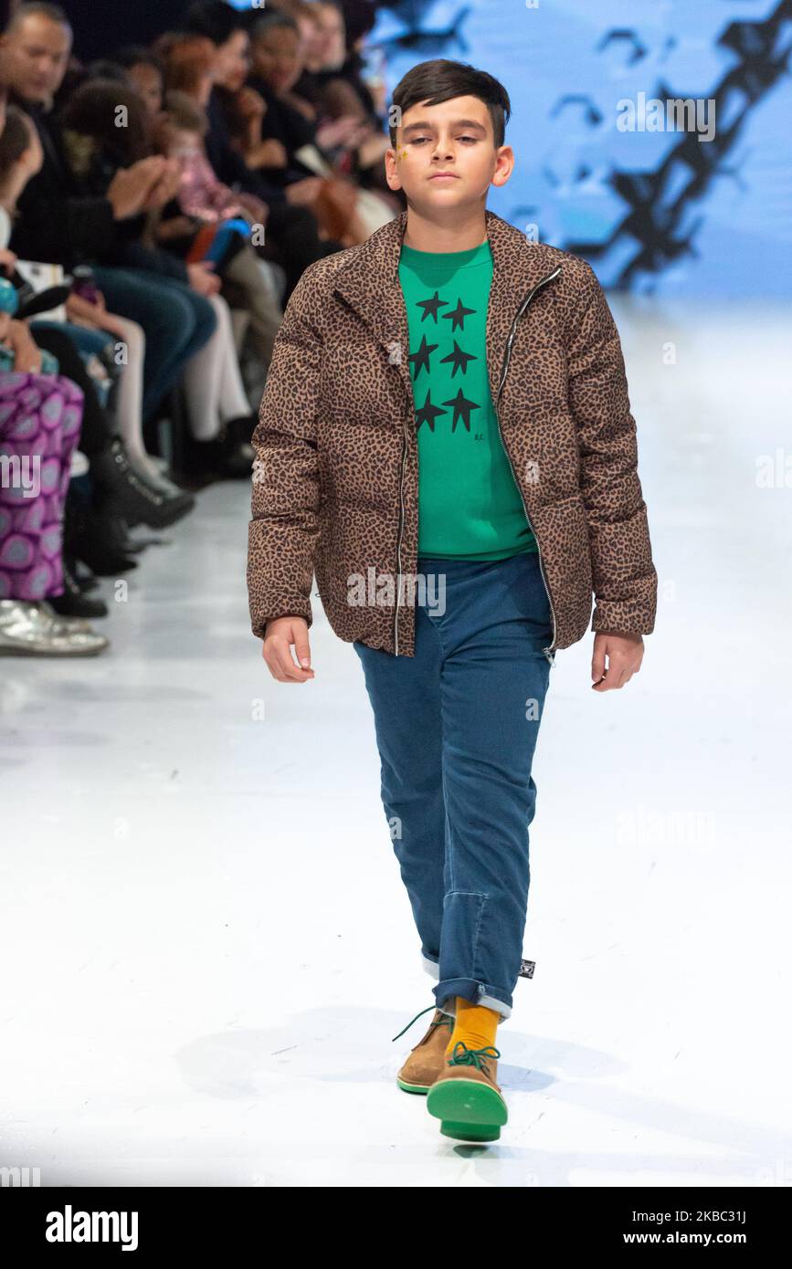 A model walks the runway at the Coyote Pretty collection for Spring and Summer 2020 during the third annual Toronto Kids Fashion Week fashion show on November 30, 2019 in Toronto, Canada (Photo by Anatoliy Cherkasov/NurPhoto) Stock Photo