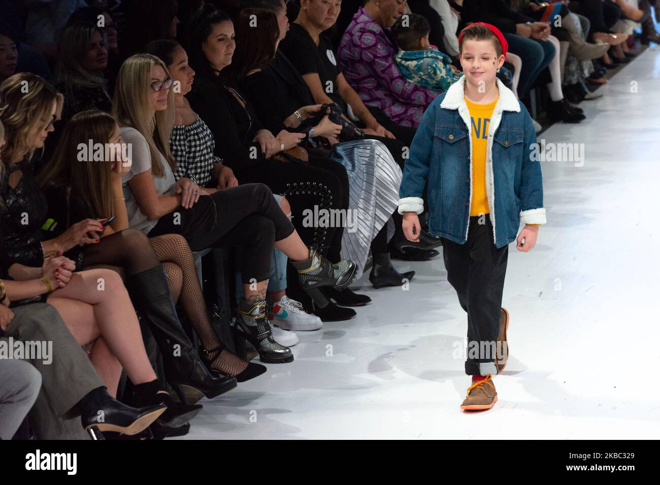 A model walks the runway at the Coyote Pretty collection for Spring and Summer 2020 during the third annual Toronto Kids Fashion Week fashion show on November 30, 2019 in Toronto, Canada (Photo by Anatoliy Cherkasov/NurPhoto) Stock Photo