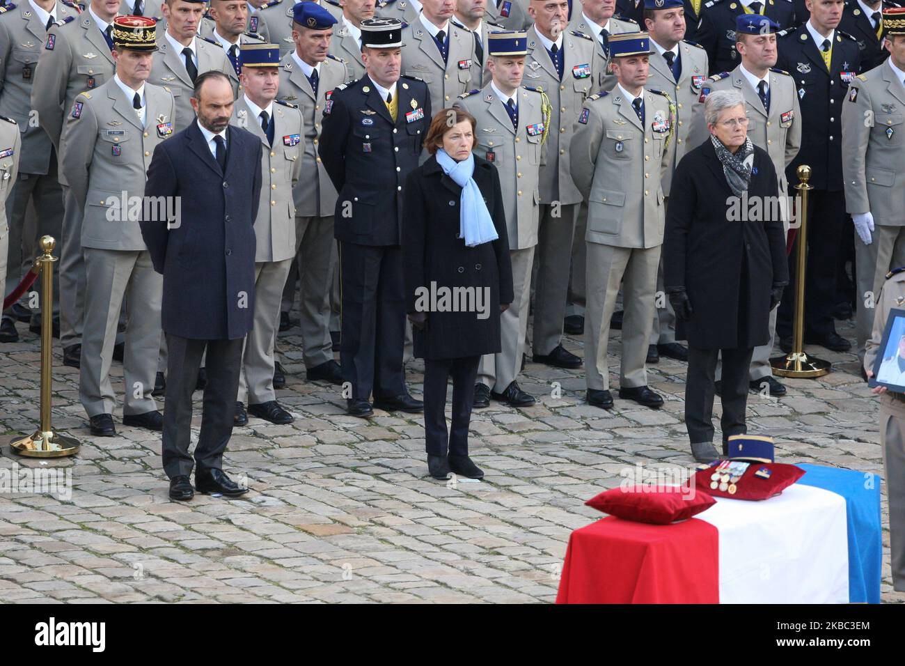 (1st row from L to R) French Prime Minister Edouard Philippe, French Defence Minister Florence Parly and French Junior Defence Minister Genevieve Darrieussecq attend a tribute ceremony on December 2, 2019 at the Invalides monument, in Paris, for the 13 French soldiers killed in Mali. In its biggest military funeral in decades, France is honoring 13 soldiers killed when their helicopters collided over Mali while on a mission fighting extremists affiliated with the Islamic State group. (Photo by Michel Stoupak/NurPhoto) Stock Photo