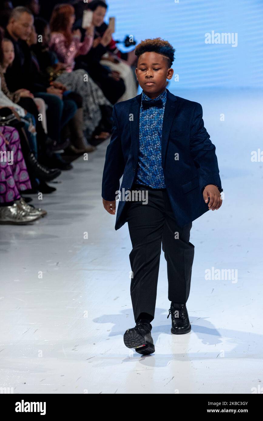 A model walks the runway at the Crawford Boys collection for Spring and Summer 2020 during the third annual Toronto Kids Fashion Week fashion show on November 30, 2019 in Toronto, Canada (Photo by Anatoliy Cherkasov/NurPhoto) Stock Photo