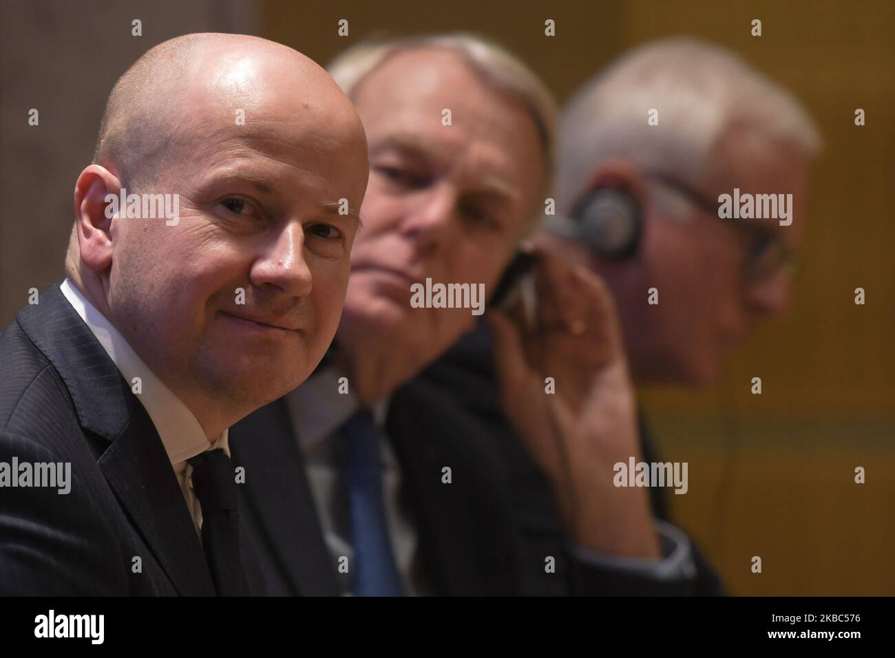 (L-R) Bartlomiej Wroblewski, a member of the Polish Parliament (Sejm) and Chair of the German-Polish Parliamentarian Group, Law and Justice Party, Jean-Marc Ayrault, a former Prime Minister and Foreign Minister of France, and Hans-Gert Pottering, a former President of the European Parliament, seen during a debate 'Facing rising divisions of European societies' at Auditorium Maximum of Jagiellonian University in Krakow. (Photo by Artur Widak/NurPhoto) Stock Photo