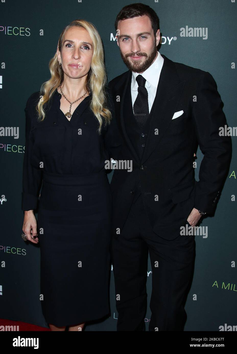 WEST HOLLYWOOD, LOS ANGELES, CALIFORNIA, USA - DECEMBER 04: Sam Taylor-Johnson and husband Aaron Taylor-Johnson arrive at the Los Angeles Special Screening Of Momentum Pictures' 'A Million Little Pieces' held at The London Hotel West Hollywood at Beverly Hills on December 4, 2019 in West Hollywood, Los Angeles, California, United States. (Photo by Xavier Collin/Image Press Agency/NurPhoto) Stock Photo
