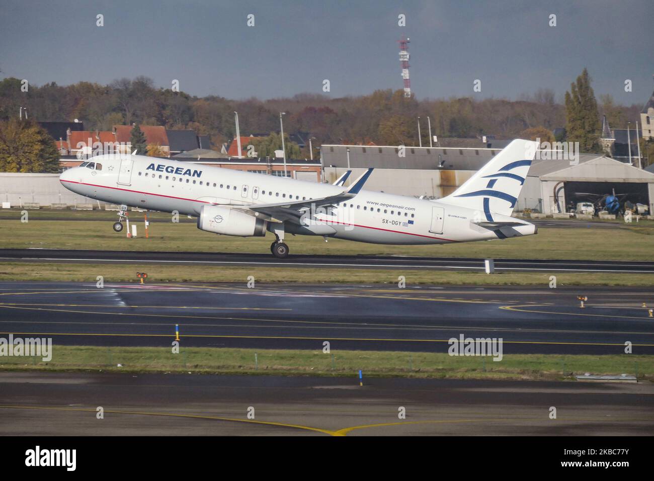 Aegean Airlines Airbus A320-200 aircraft as seen departing on rotation phase becoming airborne from Brussels Nationaal Airport Zaventem BRU EBBR during on 19 November 2019. The take-off airplane has the registration SX-DGY with 2x IAE jet engines. The airline is the flag carrier of Greece and largest Greek airline, connecting the Belgian capital with Athens ATH LGAV airport on a daily basis. A3 AEE is a Star Alliance aviation alliance member. (Photo by Nicolas Economou/NurPhoto) Stock Photo