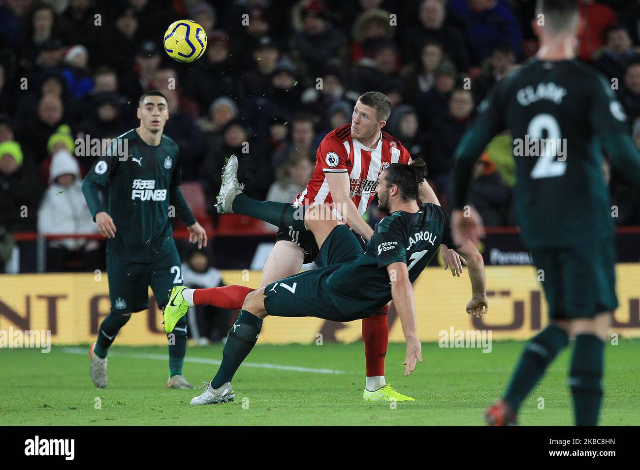 Andy Carroll of Newcastle United in action with Jack O'Connell of Sheffield United during the Premier League match between Sheffield United and Newcastle United at Bramall Lane, Sheffield on Thursday 5th December 2019. (Photo by Mark Fletcher/MI News/NurPhoto) Stock Photo