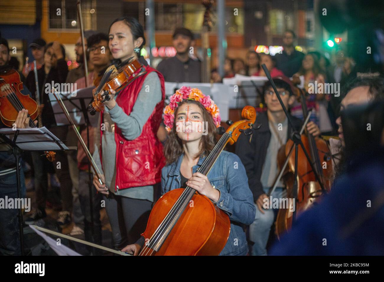 The philharmonic in a tribute they made to the indigenous guard of Cauca in the city of Bogota, Colombia on 4 December 2019. This is the third national strike in two weeks amid ongoing protests against social, security and economic policies of President Ivan Duque. Five people have died in connection with the protests since November 21. (Photo by Daniel Garzon Herazo/NurPhoto) Stock Photo