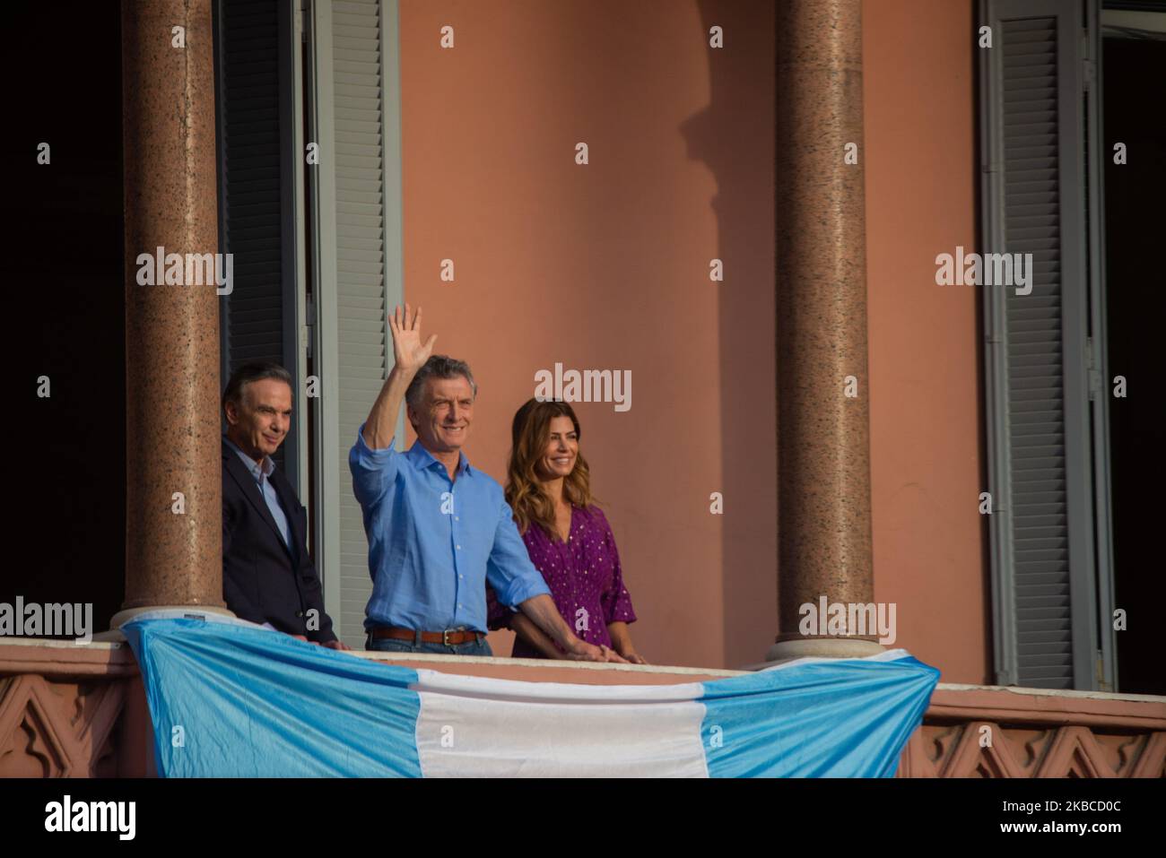 Argentina's President Mauricio Macri, center, his wife Juliana Awada and his running-mate Miguel Angel Pichetto stand on the balcony of the Casa Rosada executive mansion, during a rally in support of Macri, in Buenos Aires, Argentina, Saturday, Dec. 7, 2019 (Photo by Mario De Fina/NurPhoto) Stock Photo