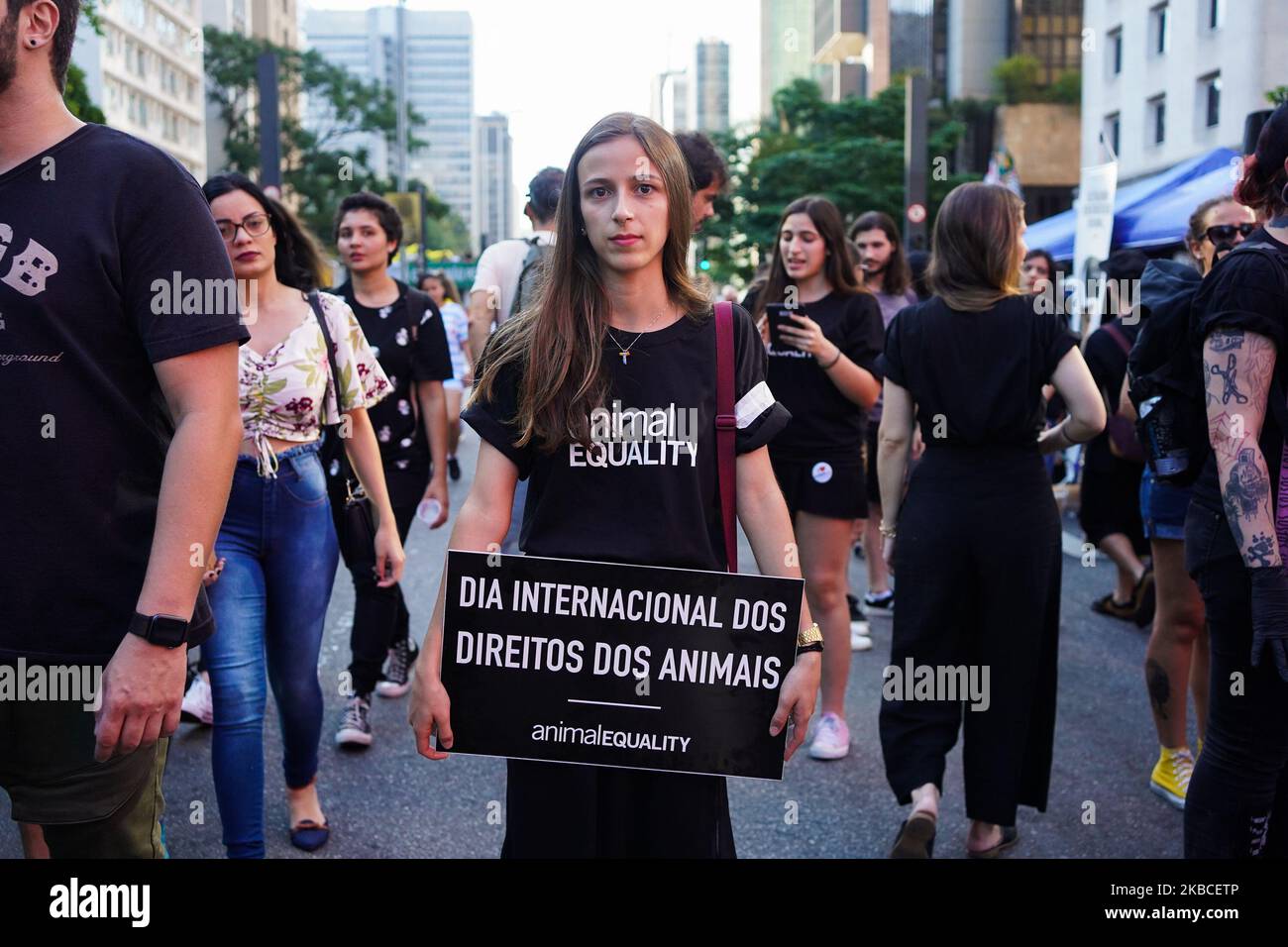 Activist holds up sign hi-res stock photography and images - Alamy