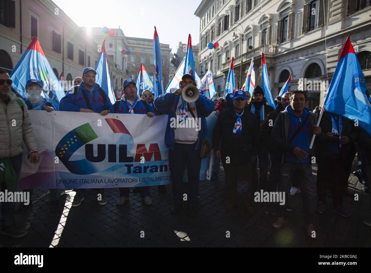 Hundreds of Ilva workers from Taranto protest in Piazza Santi Apostoli in Rome, Italy, on December 10, 2019.Workers from the FIOM metalworkers union joined other workers and unions from all sectors coming from all over Italy against the industrial crisis and the closure of factories as the Italian government is negotiating a new plan with the world's biggest steelmaker ArcelorMittal to save the Taranto steel plant. (Photo by Christian Minelli/NurPhoto) Stock Photo