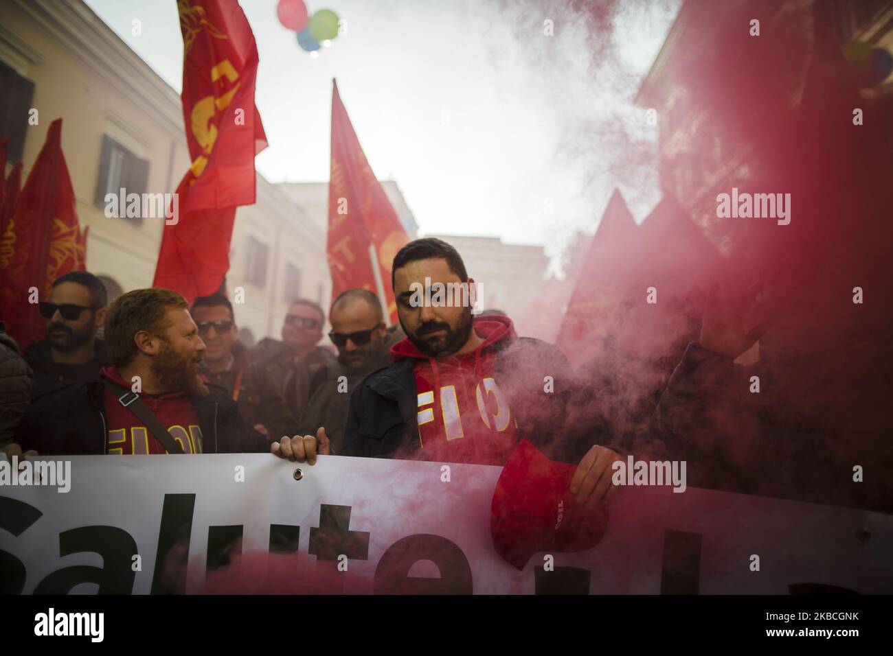 Hundreds of Ilva workers from Taranto protest in Piazza Santi Apostoli in Rome, Italy, on December 10, 2019.Workers from the FIOM metalworkers union joined other workers and unions from all sectors coming from all over Italy against the industrial crisis and the closure of factories as the Italian government is negotiating a new plan with the world's biggest steelmaker ArcelorMittal to save the Taranto steel plant. (Photo by Christian Minelli/NurPhoto) Stock Photo