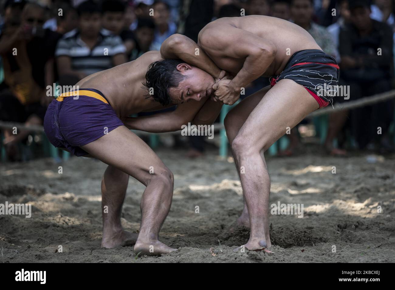 Wrestlers compete in a Rakhine traditional wrestling known as â€œKyinâ ...