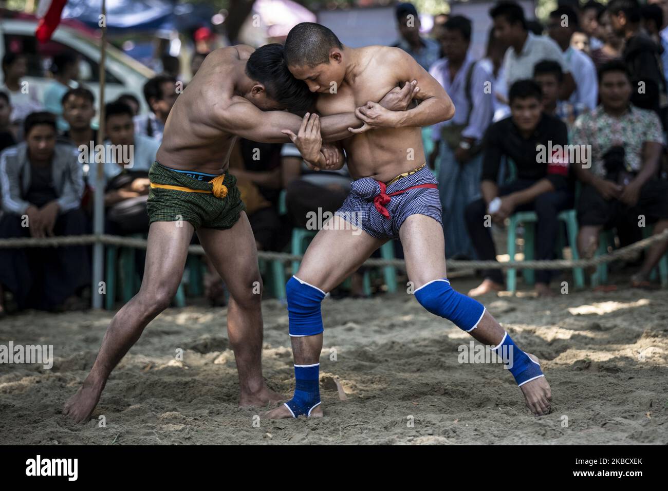 Wrestlers compete in a Rakhine traditional wrestling known as â€œKyinâ ...
