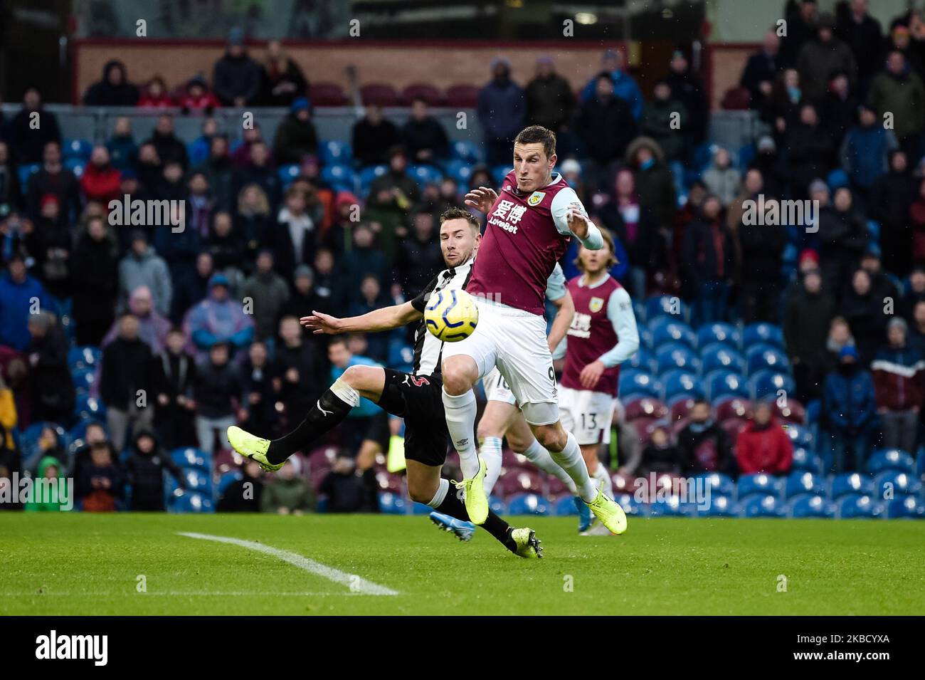 Burnley forward Chris Wood and Newcastle United defender Paul Dummett during the Premier League match between Burnley and Newcastle United at Turf Moor, Burnley on Saturday 14th December 2019. (Credit: Andy Whitehead | MI News) Stock Photo