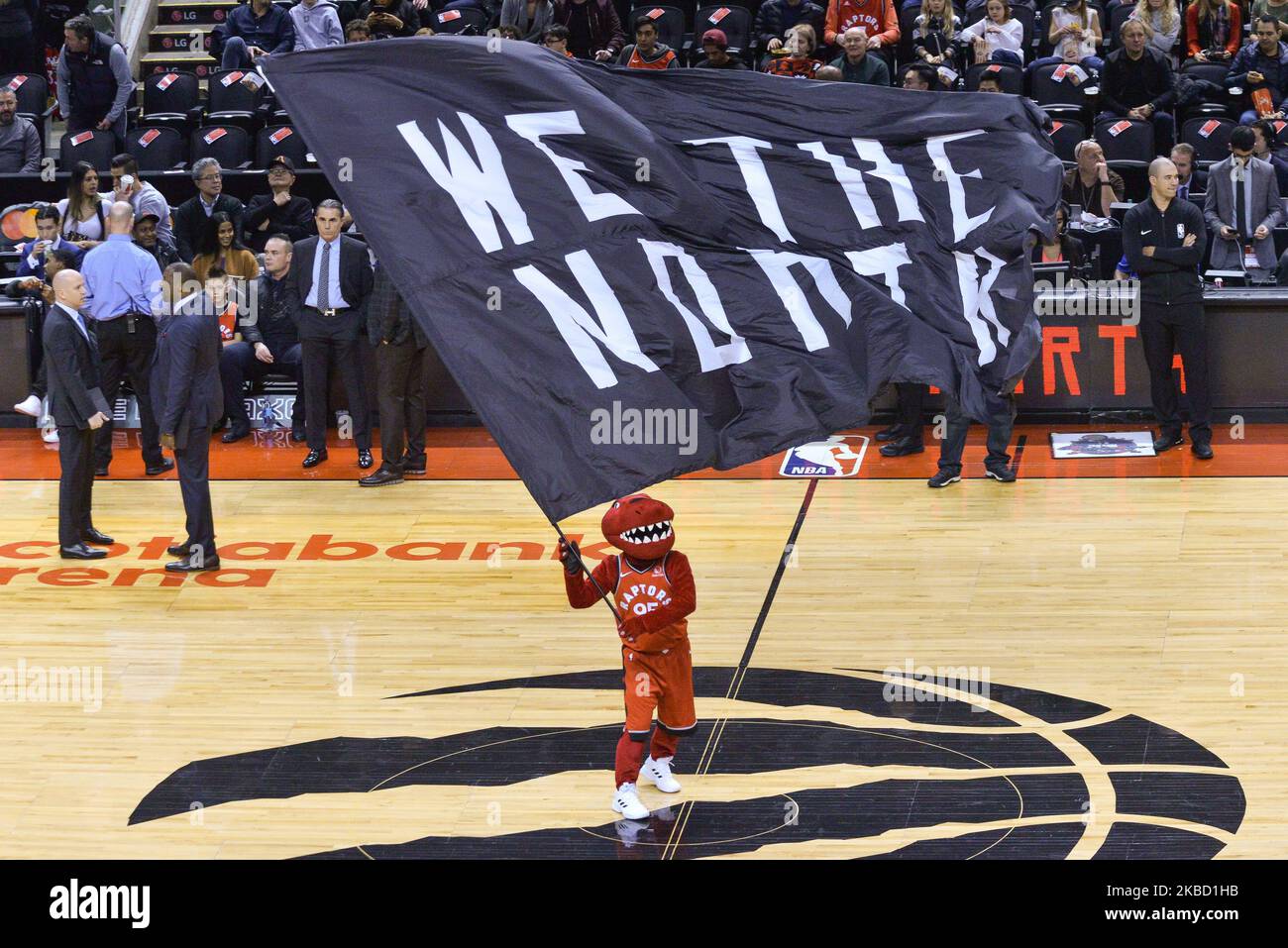 Toronto Raptors mascot with the flag during the Toronto Raptors vs Brooklyn Nets NBA regular season game at Scotiabank Arena on December 14, 2019, in Toronto, Canada (Raptors won 110:102) (Photo by Anatoliy Cherkasov/NurPhoto) Stock Photo