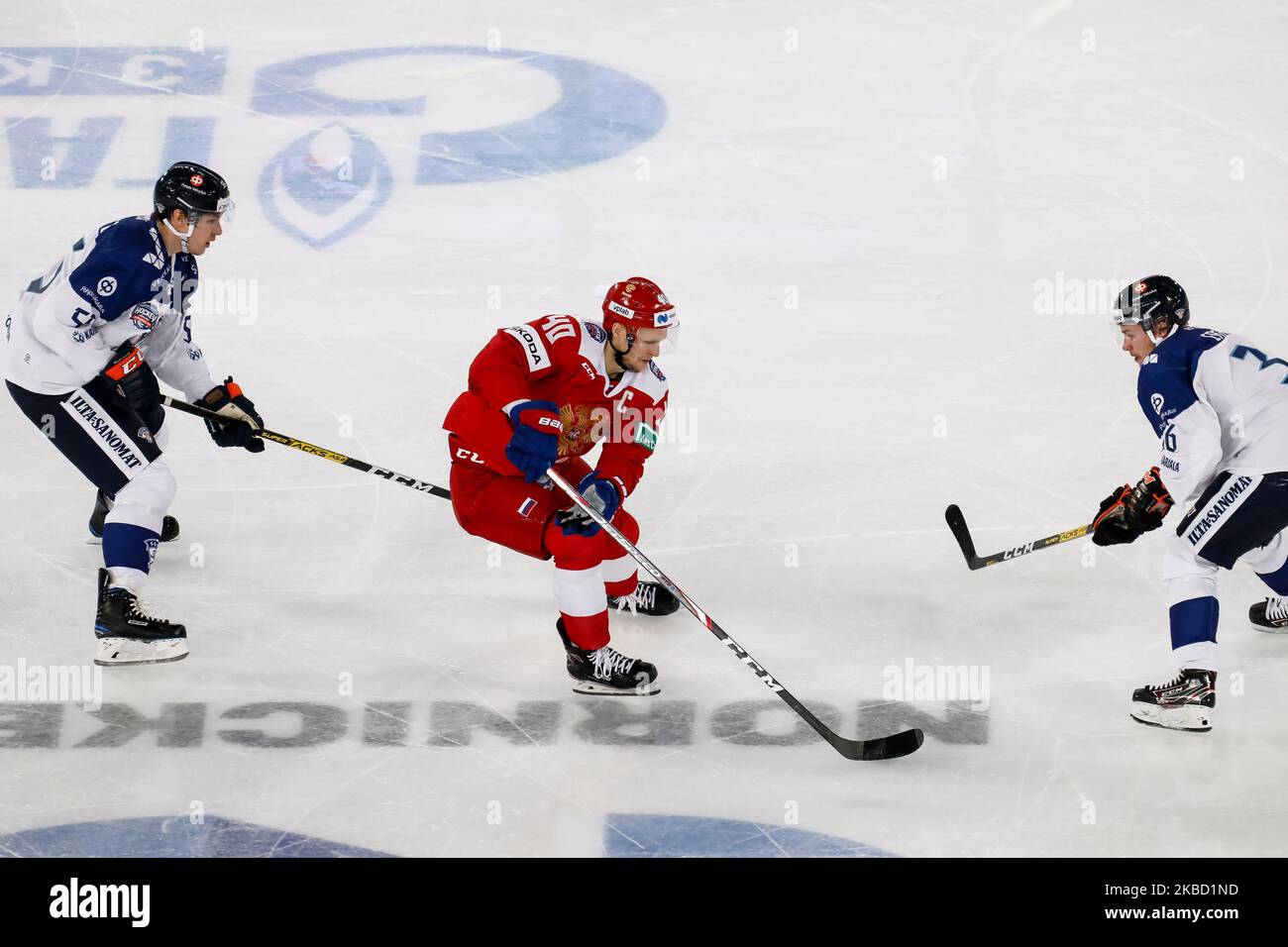 Evgeny Ketov (C) of Russia in action against Miika Koivisto (L) and Elmeri Eronen of Finland during the Euro Hockey Tour Channel One Cup ice hockey match between Russia and Finland on December 15, 2019 at Gazprom Arena in Saint Petersburg, Russia. (Photo by Mike Kireev/NurPhoto) Stock Photo