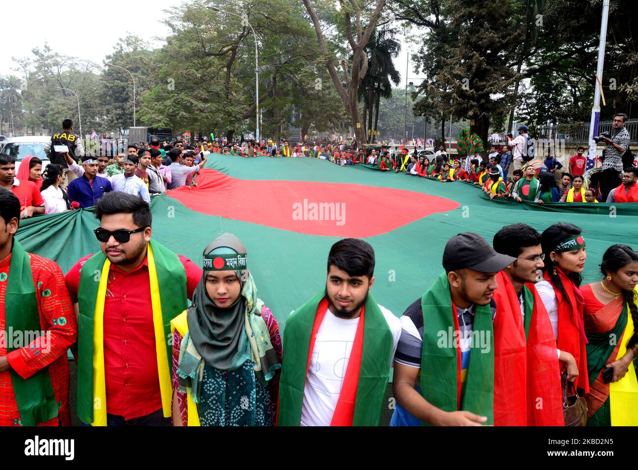 Bangladeshi people participate in a rally during the Victory Day celebrations in Dhaka, Bangladesh on December 16, 2019. Bangladesh marks its 48th Victory Day to commemorate the victory of the Allied forces High Command over the Pakistani forces in the Bangladesh Liberation War in 1971. Bangladesh became a free nation on 16 December 1971 after a nine-month bloody war with Pakistan. (Photo by Mamunur Rashid/NurPhoto) Stock Photo