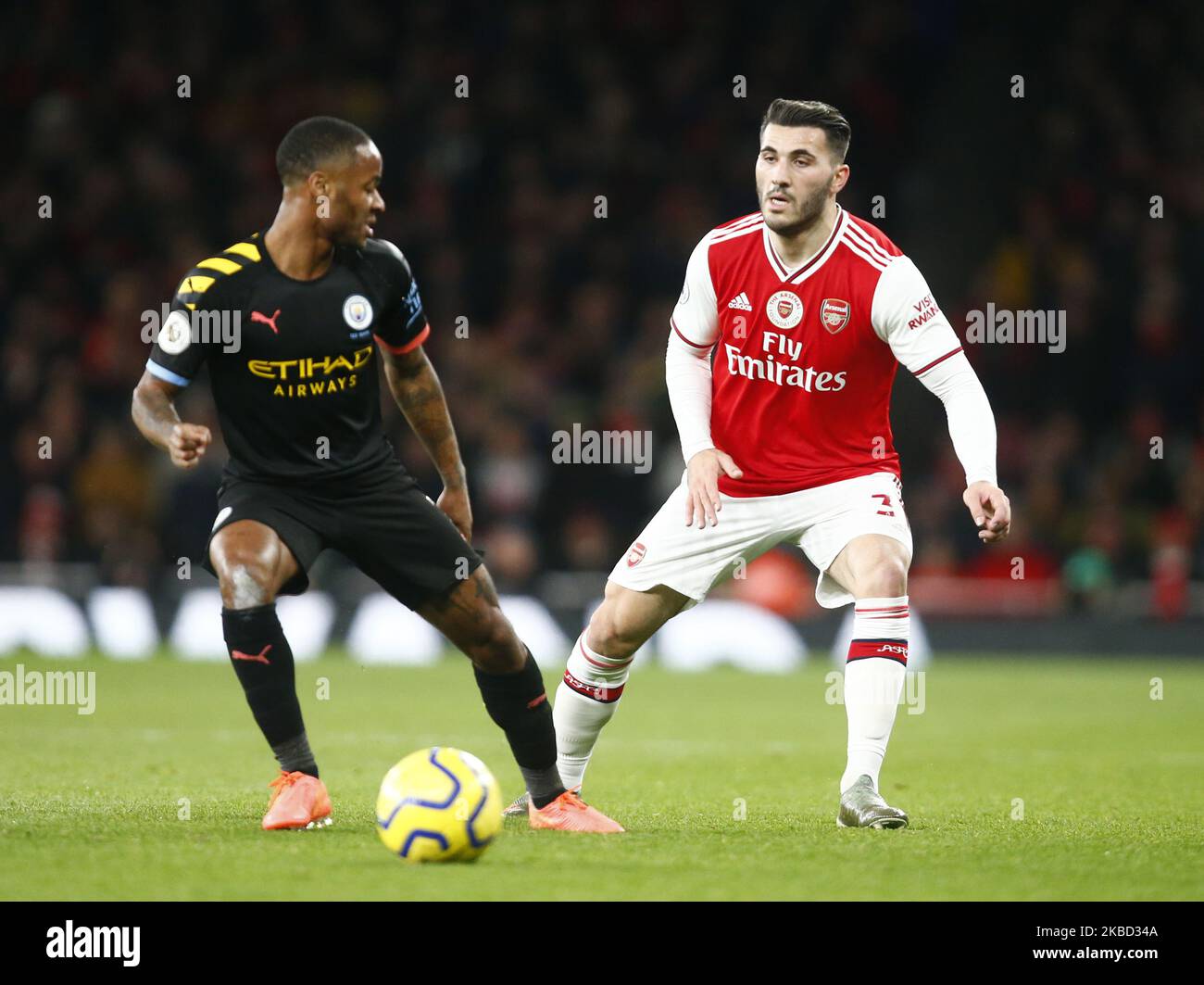 L-R Manchester City's Raheem Sterling and Sead Kolasinac of Arsenal during English Premier League between Arsenal and Manchester City at Emirates stadium , London, England on 15 December 2019. (Photo by Action Foto Sport/NurPhoto) Stock Photo