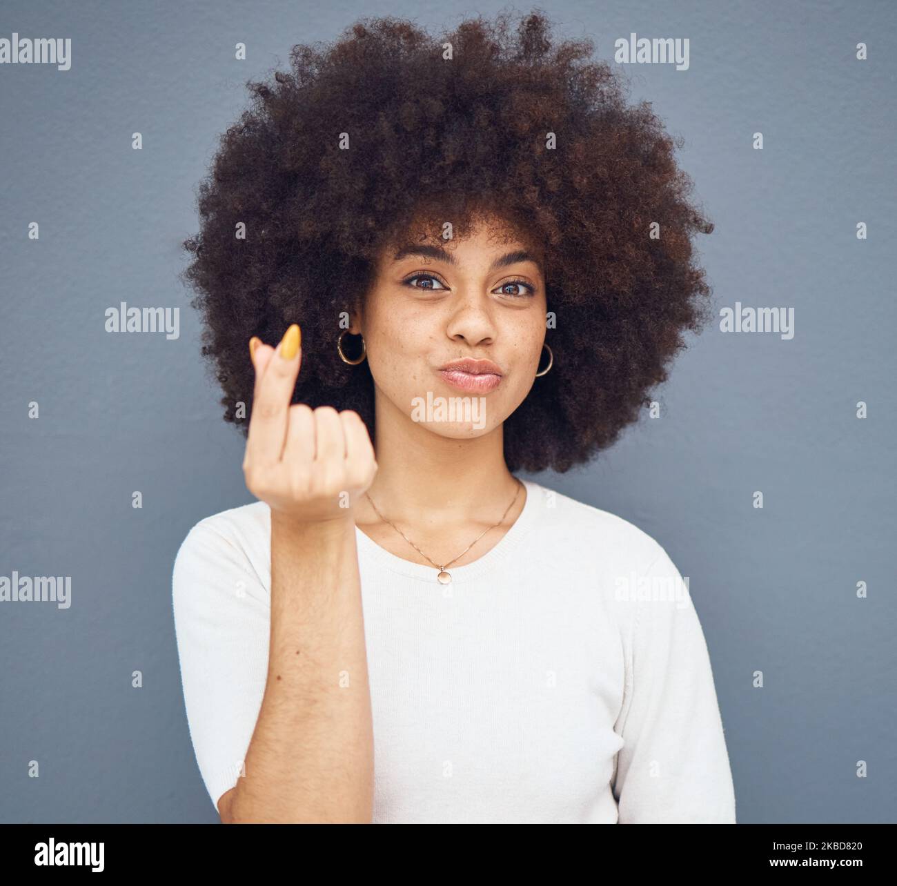 Girl crossing heart hi-res stock photography and images - Alamy