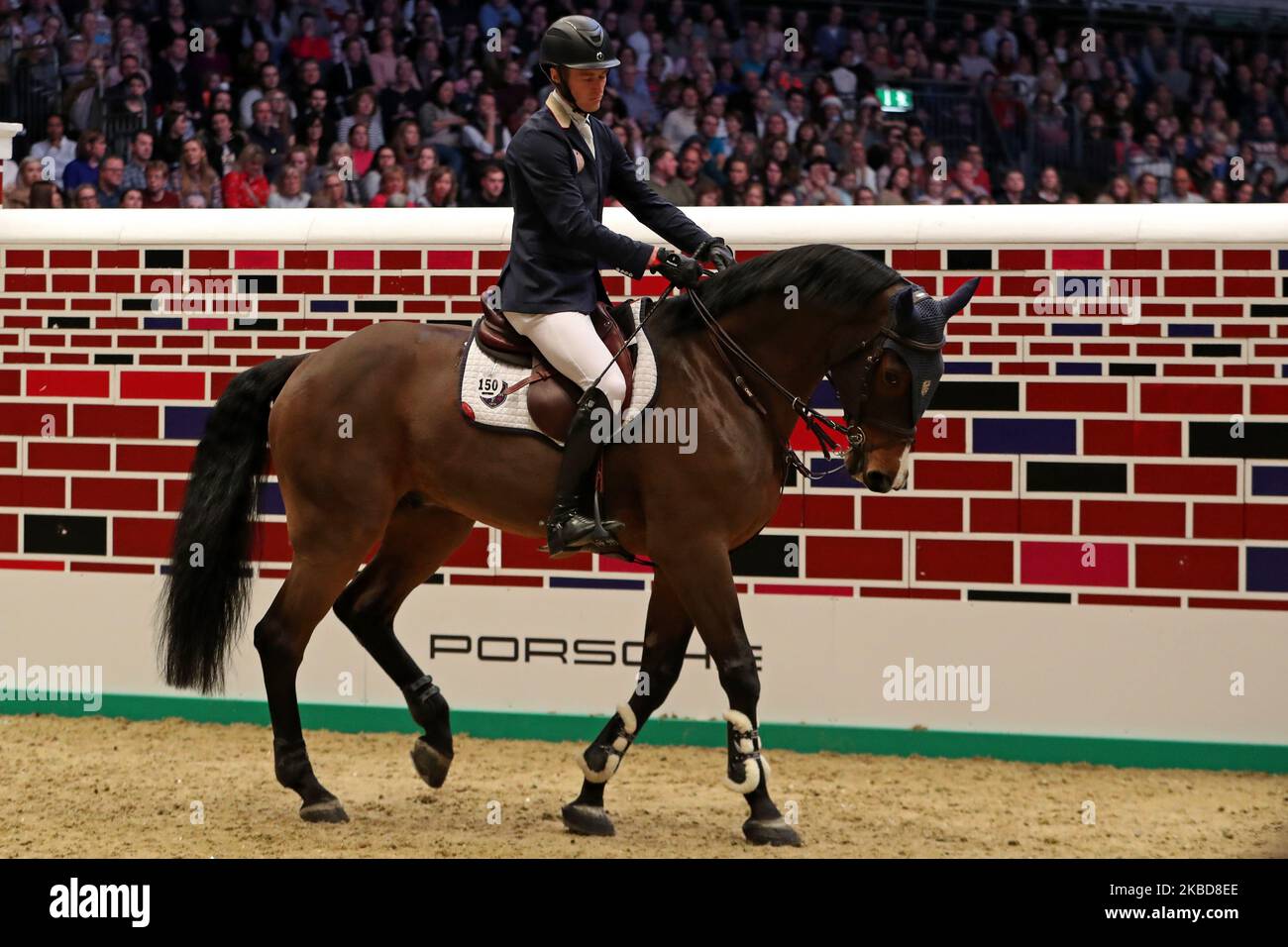 William Whitaker riding RMF Charly during the Cayenne Puissance Event at the International Horse Show at Olympia, London on Wednesday 18th December 2019. (Photo by Jon Bromley/MI News/NurPhoto) Stock Photo