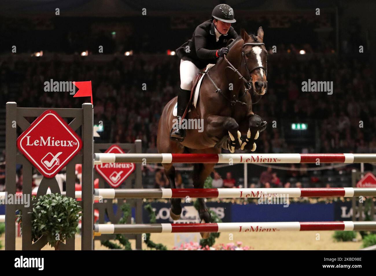 Karline de Brabander riding Fantamos de Muze during the Lemieux Six Bar at the International Horse Show at Olympia, London on Thursday 19th December 2019. (Photo by Jon Bromley/MI News/NurPhoto) Stock Photo