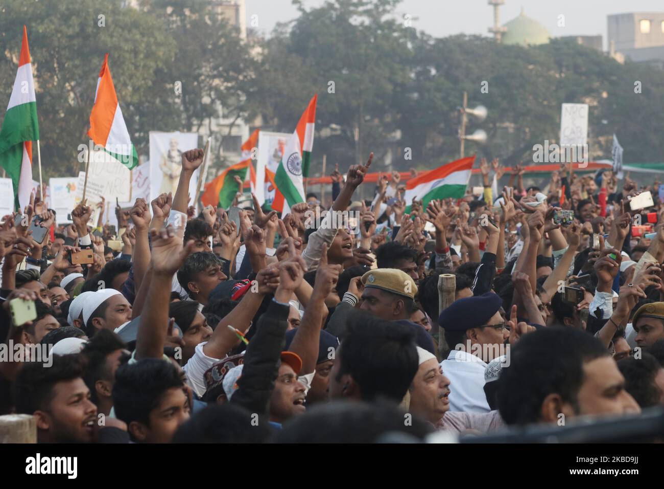 Chief minister of West Bengal state and Supremo of the Trinamool Congress (TMC) Political Party Mamata Banerjee (C) address (Not in the Pictures ) and Protestors part in the rally during a rally demanding the withdrawal of the Citizenship Amendment Act and National Register of Citizens (NRC) in Kolkata, India, Friday, Dec. 20, 2019. (Photo by Debajyoti Chakraborty/NurPhoto) Stock Photo